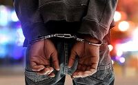 criminal offense - man in handcuffs